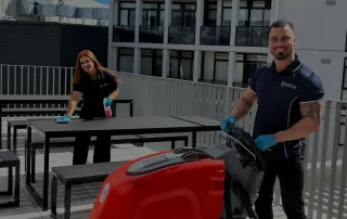 Versatile Property Services cleaning team using professional equipment for outdoor and commercial space maintenance